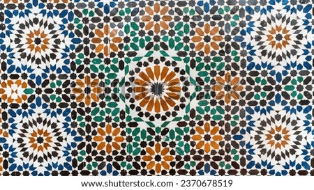 Traditional Morocco tiles with Islamic design, handcrafted colorful patterns like geometric shapes and floral motifs. These tiles are used to decorate walls and floors in homes and mosques.