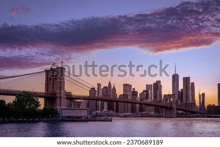 The Manhattan Skyline with the Brooklyn Bridge at Sunset