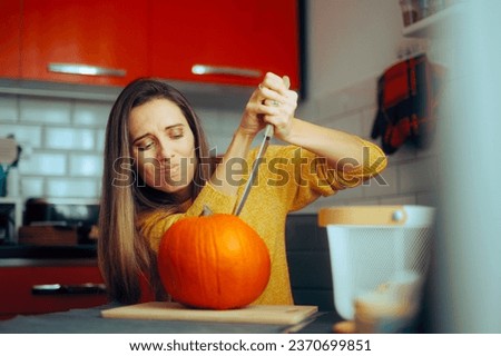 
Woman Holding a Knife Ready to Carve a Halloween Pumpkin. Stressed lady feeling bored thinking what to cook for autumnal holidays
 Royalty-Free Stock Photo #2370699851