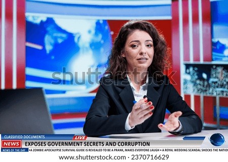 Classified records displaying state secrets and criminal activities were leaked on television broadcast. News reporter live reporting on evening program, discussing about injustice and payoffs. Royalty-Free Stock Photo #2370716629