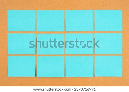 Blank sticky notes on wooden board for your text or message.