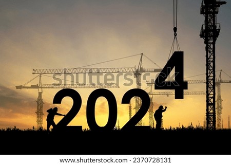 Construction 2024 concept ,Silhouette of staff as a team to prepare to welcome the 2024.Happy New Year 2024