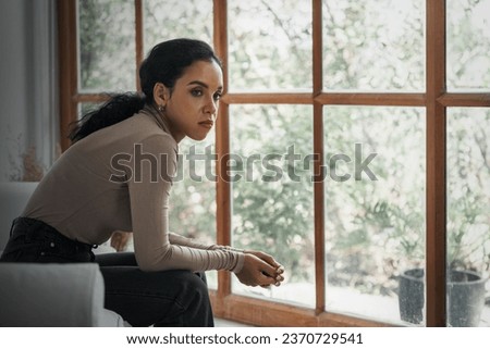 Depressed young Black woman with mental health problem in mind need crucial treatment from overthinking fatigue girl, disruptive thought, dissocial, anxiety and other mental health disorders . Royalty-Free Stock Photo #2370729541