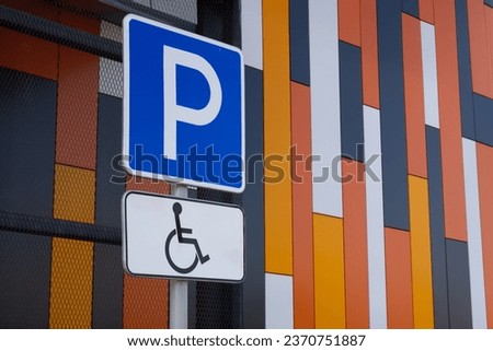 Close-up of road signs Parking and Handicapped. Reserved parking space for Disabled person or Mobility impaired people