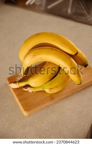 Ripe Bananas on a Table: Colorful and Healthy Fruit Stock Photography