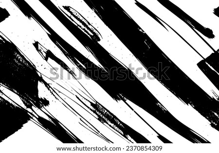 Black and white grunge texture. Black streaks of paint, ink, and dirt. Abstract monochrome background. Pattern of scratches, chips, and wear