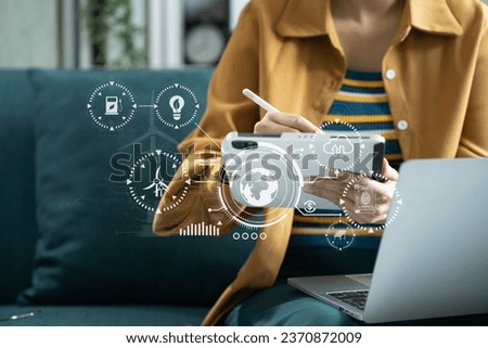Woman using computer on CO2 emission reduction concept with global warming icon. along with climate, energy, sustainability, environment.