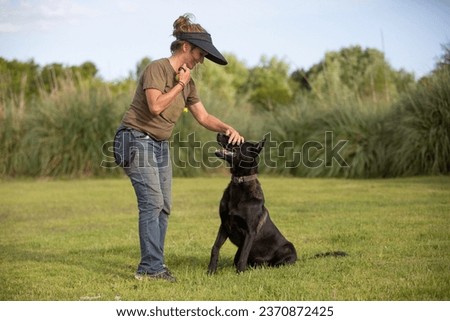 Cutest and amazing dog, black malinois raze Royalty-Free Stock Photo #2370872425