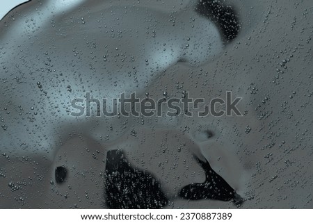 gel texture on a dark background