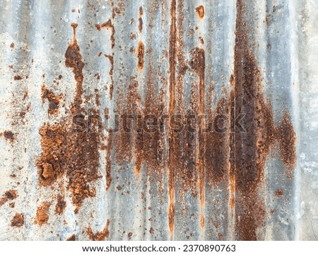 Artistic of old and rusty zinc sheet wall, vintage style metal sheet roof texture, old metal sheet pattern, rusted metal or siding, corrosion of galvanized. Concept for retro and texture background.