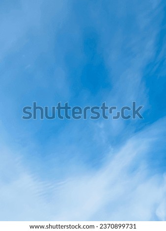 Blue sky slightly white cloud. Beautiful sky. Royalty-Free Stock Photo #2370899731