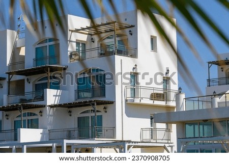 white houses in Mediterranean style against a blue sky 1