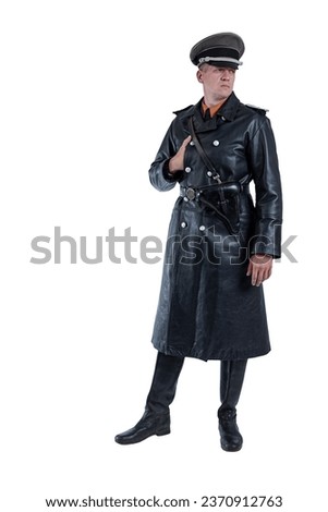 Male actor reenactor in historical uniform as an officer of the German Army during World War II Royalty-Free Stock Photo #2370912763