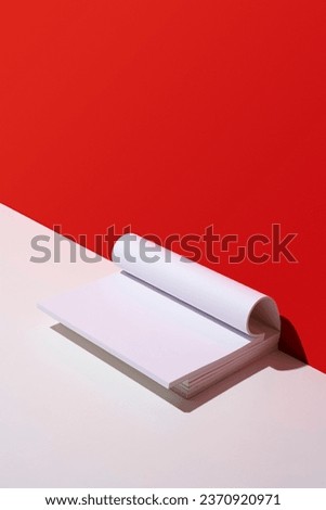 White blank cover magazines over red and white background. Open book, magazine page  mockup