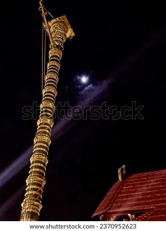 Sabarimala Temple aglow with full moon in the night, a celestial sanctuary of devotion Royalty-Free Stock Photo #2370952623