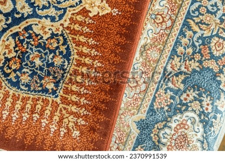 Handmade Carpet. textures and background of ancient handmade carpets and rugs. Top view.