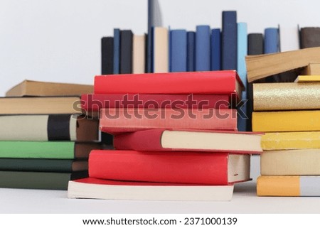 stack of books on a white background education school library