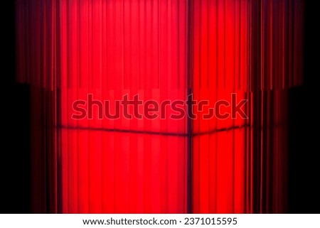 Neon red light on black shadow background, beautiful red light,Abstract background neon red light and line,glow lines,architecture lights,Beautiful lamp, warm colors, isolated background.