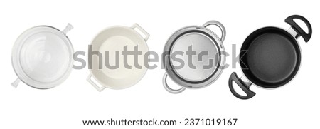 Set with different pots isolated on white, top view Royalty-Free Stock Photo #2371019167