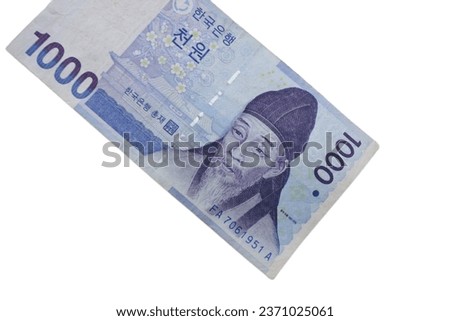 Korean won money isolated on white background, 1000 won or thousand won Royalty-Free Stock Photo #2371025061