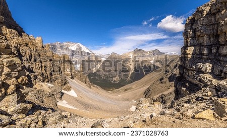 View of the Paradise Valley on the other side of the Sentinel Pass and Grand Sentinel that is an obelisk rock tower on the back side of Pinnacle Mountain, in Banff National Park, Alberta, Canada Royalty-Free Stock Photo #2371028763