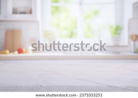 Selective focus.Elegance product display background with marble top with kitchen wall window garden in morning.minimal counter design
