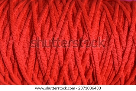 Pink neon polyester cord, abstract background, hobby material Royalty-Free Stock Photo #2371036433