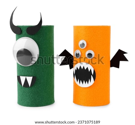 Monsters made of felt isolated on white. Halloween decoration