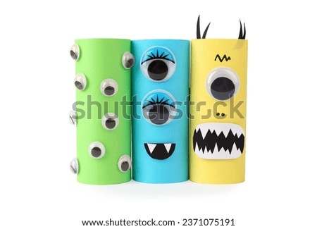 Monsters made of paper isolated on white. Halloween decoration
