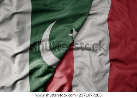 big waving realistic national colorful flag of pakistan and national flag of peru . macro