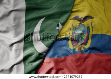 big waving realistic national colorful flag of pakistan and national flag of ecuador . macro