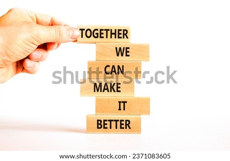 Together make better symbol. Concept words Together we can make it better on wooden block. Beautiful white table white background. Businessman hand. Business we make it better concept. Copy space. Royalty-Free Stock Photo #2371083605