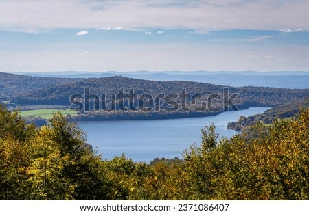 View from overlook of the autumn colors of Mt Davis towards High Point Lake in south western Pennsylvania Royalty-Free Stock Photo #2371086407