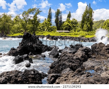 The Volcanic Shoreline at Keanae Lookout, Keanae, Maui, Hawaii, USA Royalty-Free Stock Photo #2371139293