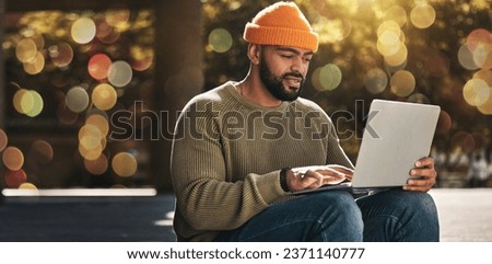 Student, man and computer at outdoor campus for university, college and scholarship research or studying in park. African person on laptop streaming for online education, website or e learning banner