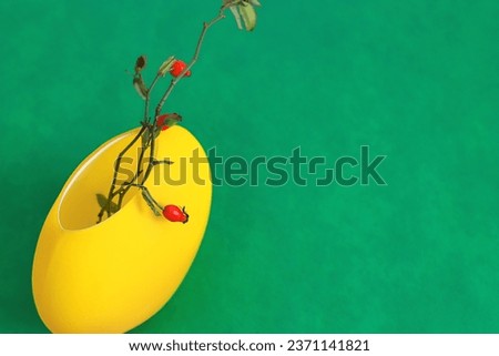 red viburnum in a yellow vase on a blue background, viburnum in a vase, flowers in a yellow vase, blue background, contrast bouquet, yellow, red, blue, red berries, congratulations, postcard, holiday,