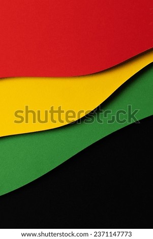 Abstract geometric black, red, yellow, green color background. Black History Month color background with copy space for text Royalty-Free Stock Photo #2371147773