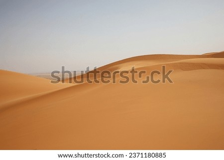 Merzouga desert offers stunning sand dunes, majestic mountains, and the Moroccan charm you'll love. Experience it all in one place! Royalty-Free Stock Photo #2371180885
