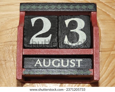 Today's date calendar red and black cubes August 23