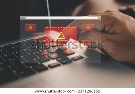 developer using computer laptop with triangle caution warning sign for notification error and maintenance concept. Computer virus detected, network security and maintenance concept.
