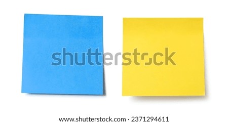 Blank crumpled Yellow sticky note and Blue sticky note isolated on white background. Template for your projects. Front view sticky note on wall. Close up. 