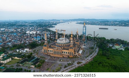 Samarinda Islamic Center Mosque, also known as Baitul Muttaqien Mosque, is a mosque located in the subdistrict of Teluk Lerong Ulu, Samarinda, East Kalimantan, Indonesia Royalty-Free Stock Photo #2371326515