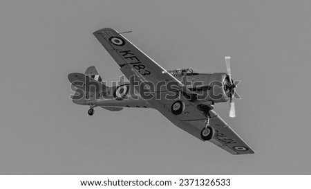Black and White photo of WWII aircraft on finals into east midlands airport EMA 
