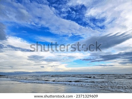 Gray Clouds and Blue Sky In The Sea Beach