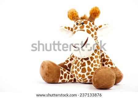 Soft toy Giraffe. Isolated on a white background.