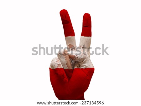 Hand making the V sign austria country flag painted