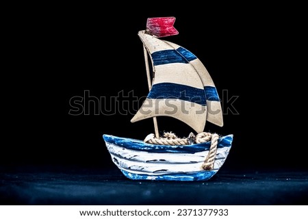 Boat souvenir isolated on black background