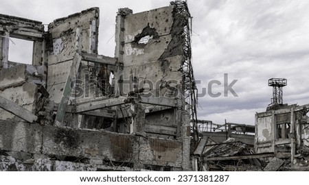 destroyed buildings of the workshop of the Azovstal plant in Mariupol war in Ukraine with Russia Royalty-Free Stock Photo #2371381287