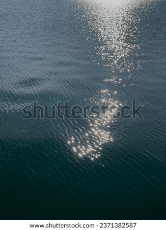 aerial view sea surface during sunset