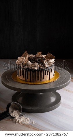 Chocolate Cake, a decadent cocoa delight. This image captures the rich layers and glossy chocolate frosting